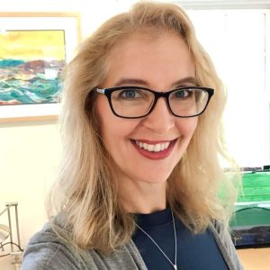 Lisa Decker Griffith, Maine real estate broker, smiling in professional headshot