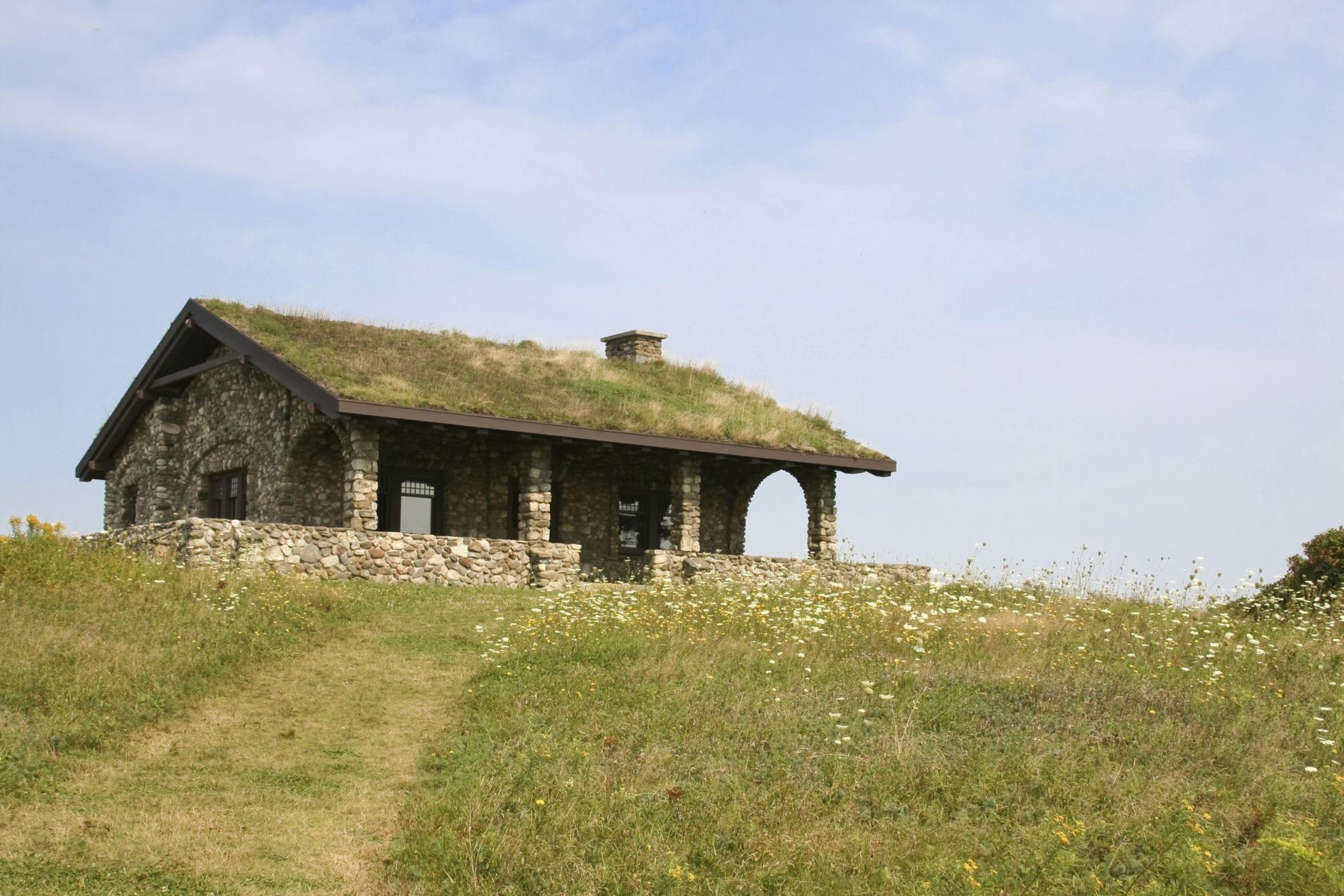 Beech Hill Preserve stone hut on grassy hilltop in Rockport Maine