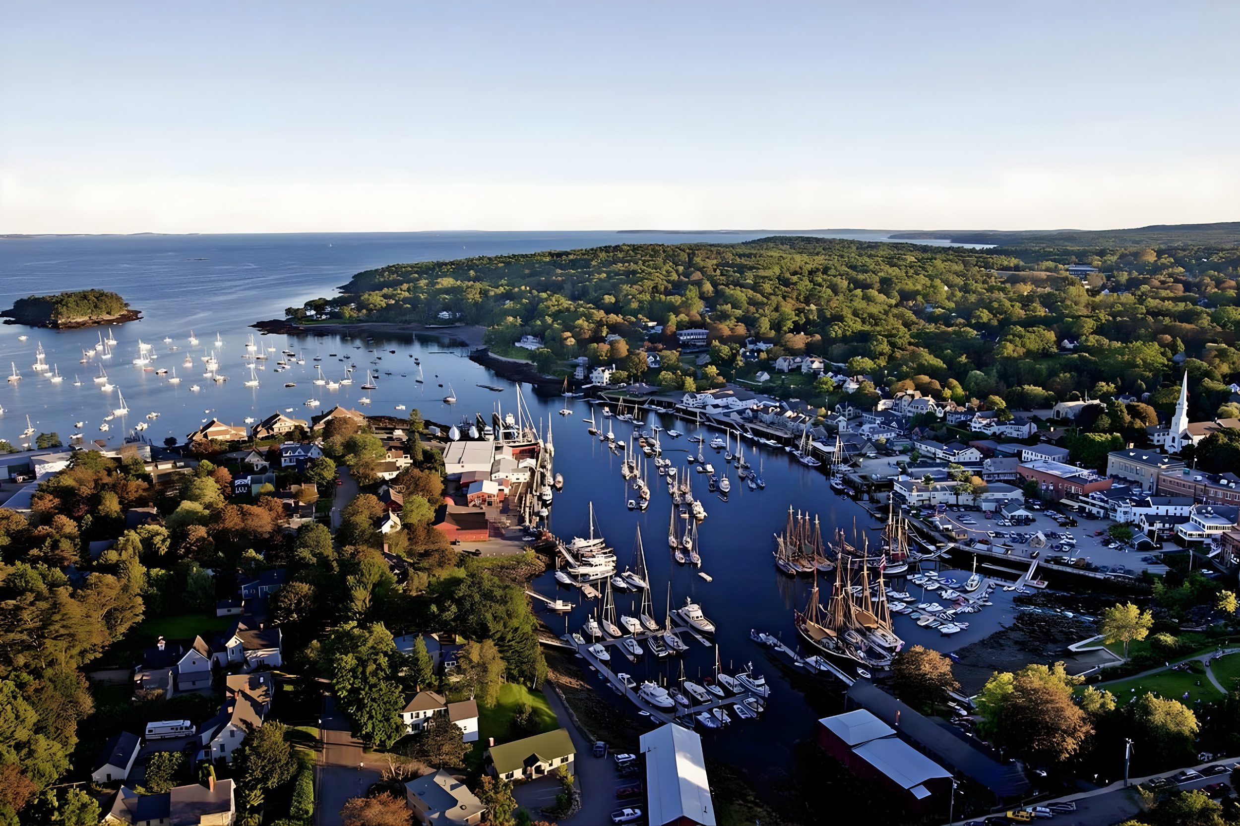 Camden Harbor Maine with boats and waterfront village