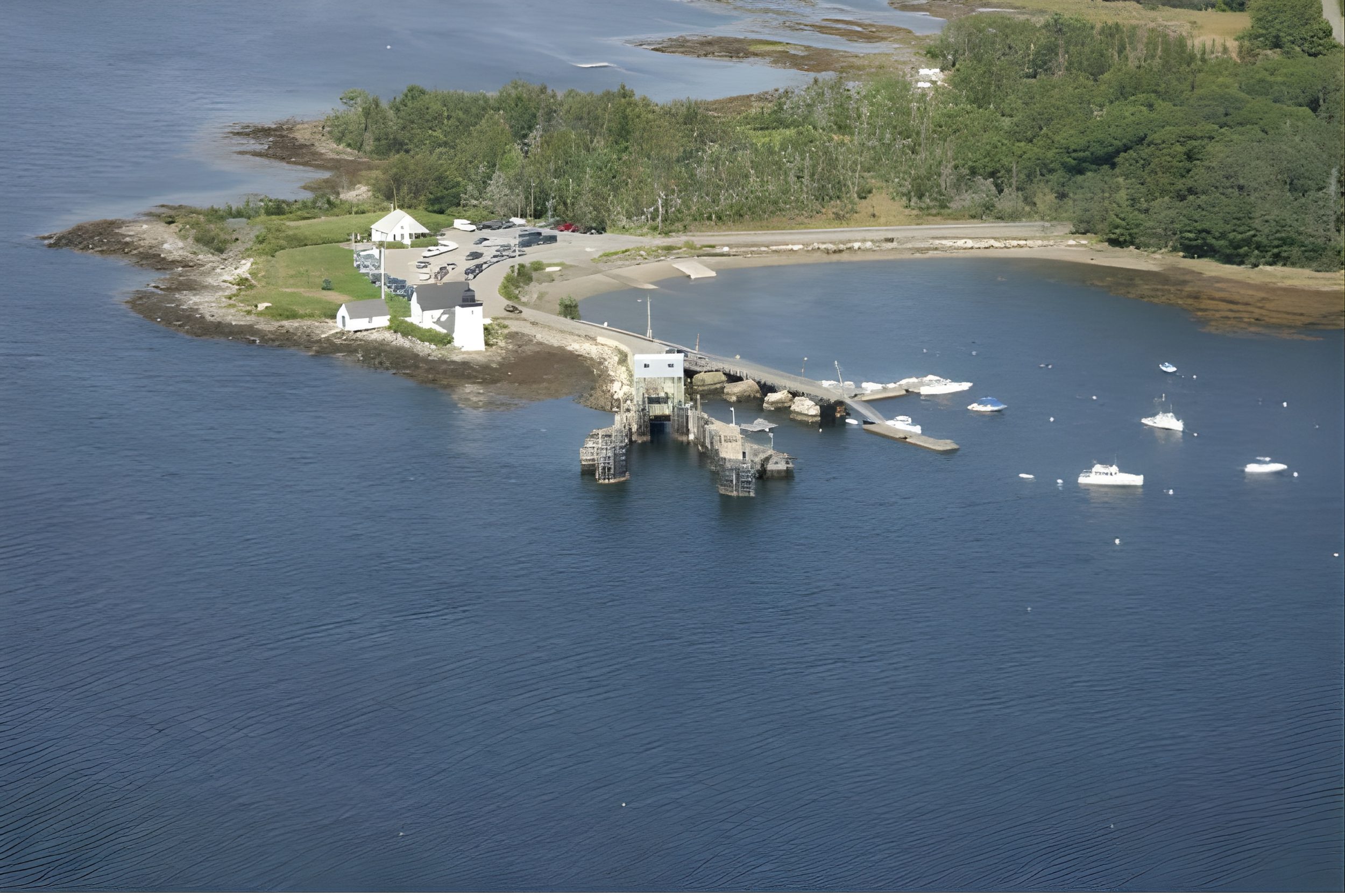 Islesboro ferry terminal in Lincolnville Maine with dock and boats on Penobscot Bay