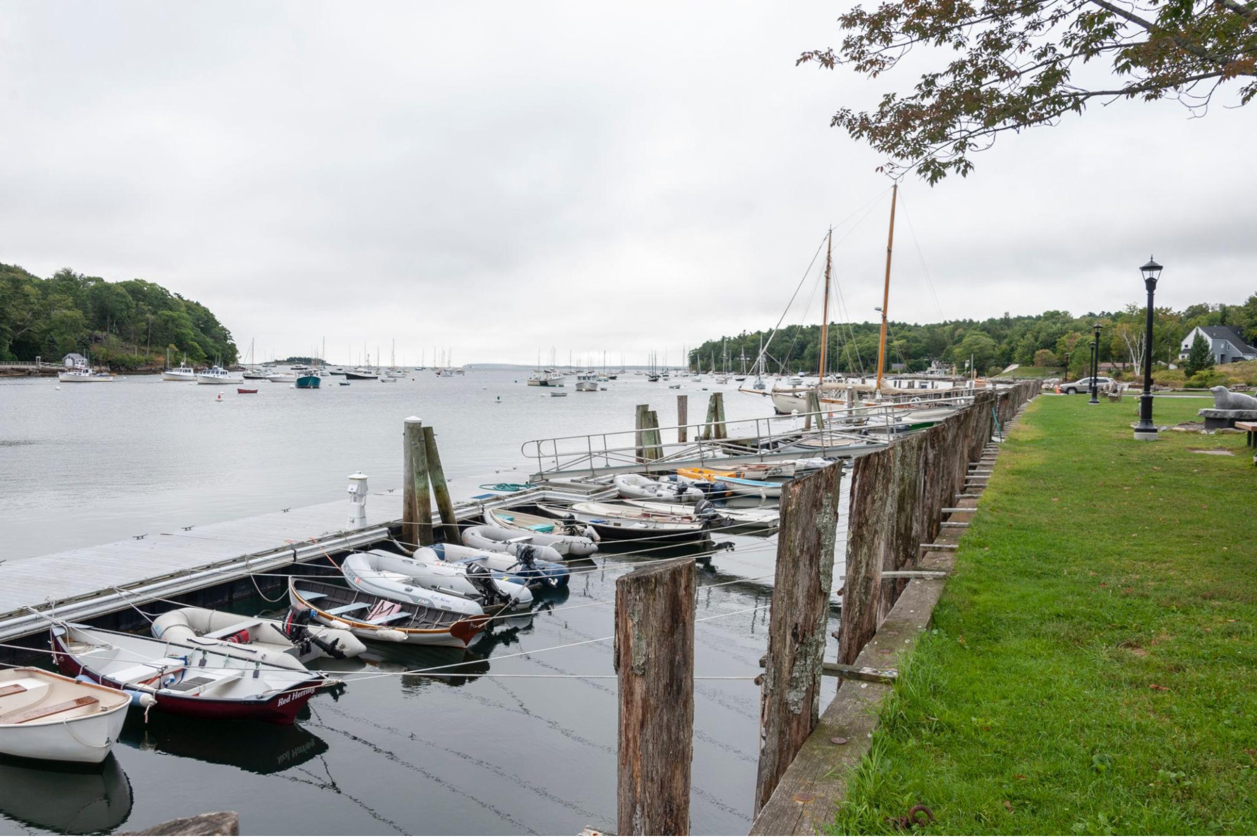 Rockport Marine Park waterfront with small boats docked along the harbor in Rockport Maine