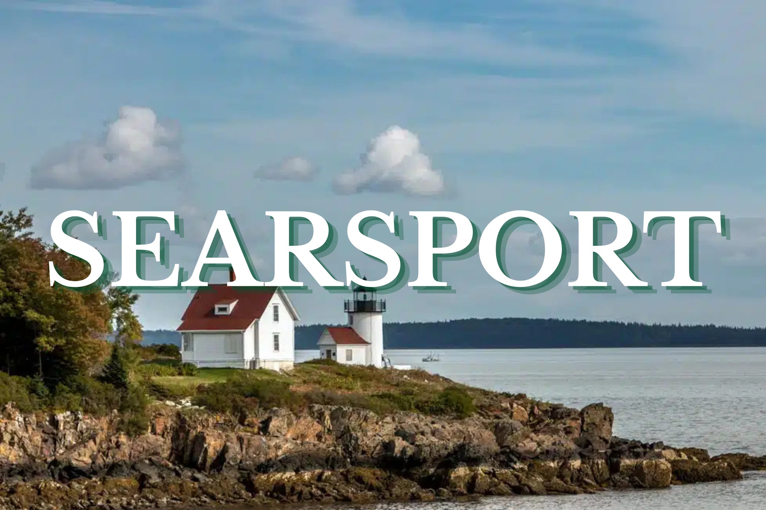 Lighthouse on rocky shoreline overlooking the ocean in Searsport, Maine