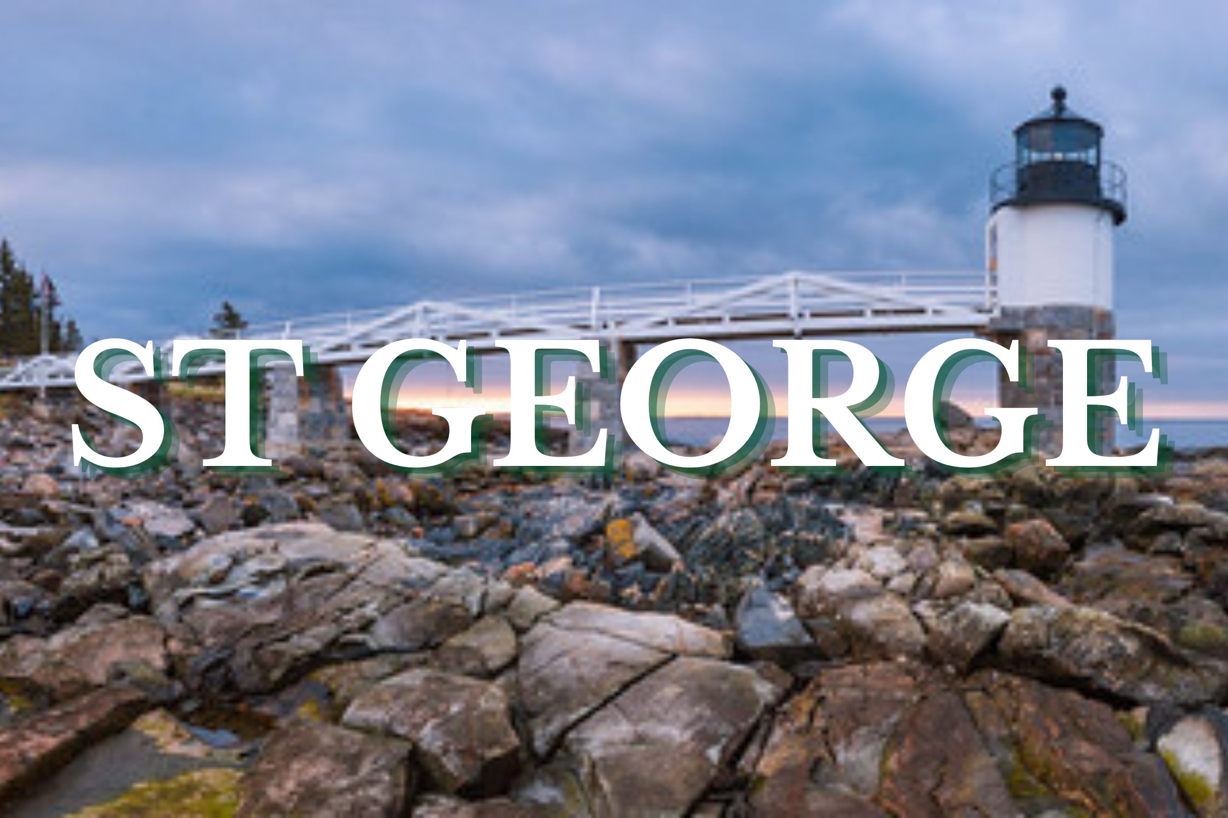 Marshall Point Lighthouse and wooden walkway on the rocky coast in St. George, Maine