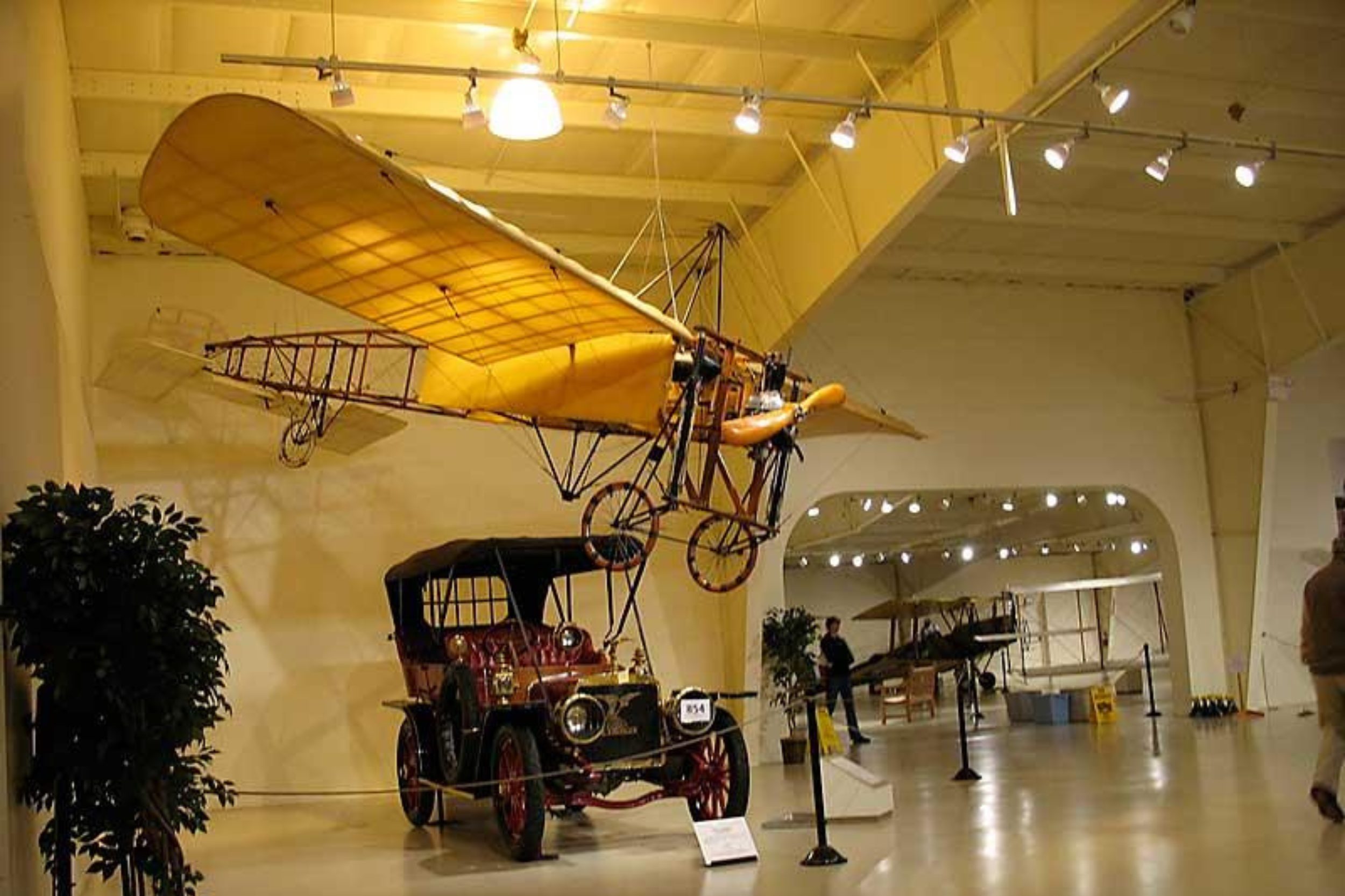 Historic aircraft display inside Owls Head Transportation Museum in Maine