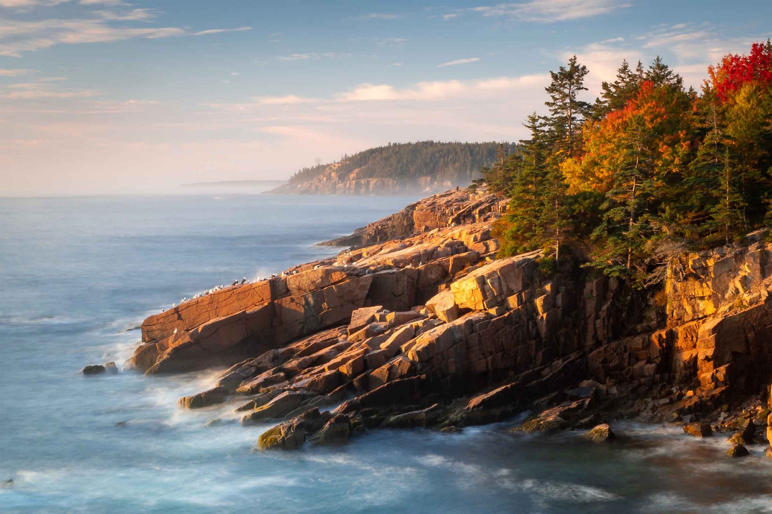 Rocky coastline and ocean views near Searsport Harbor in Midcoast Maine during autumn